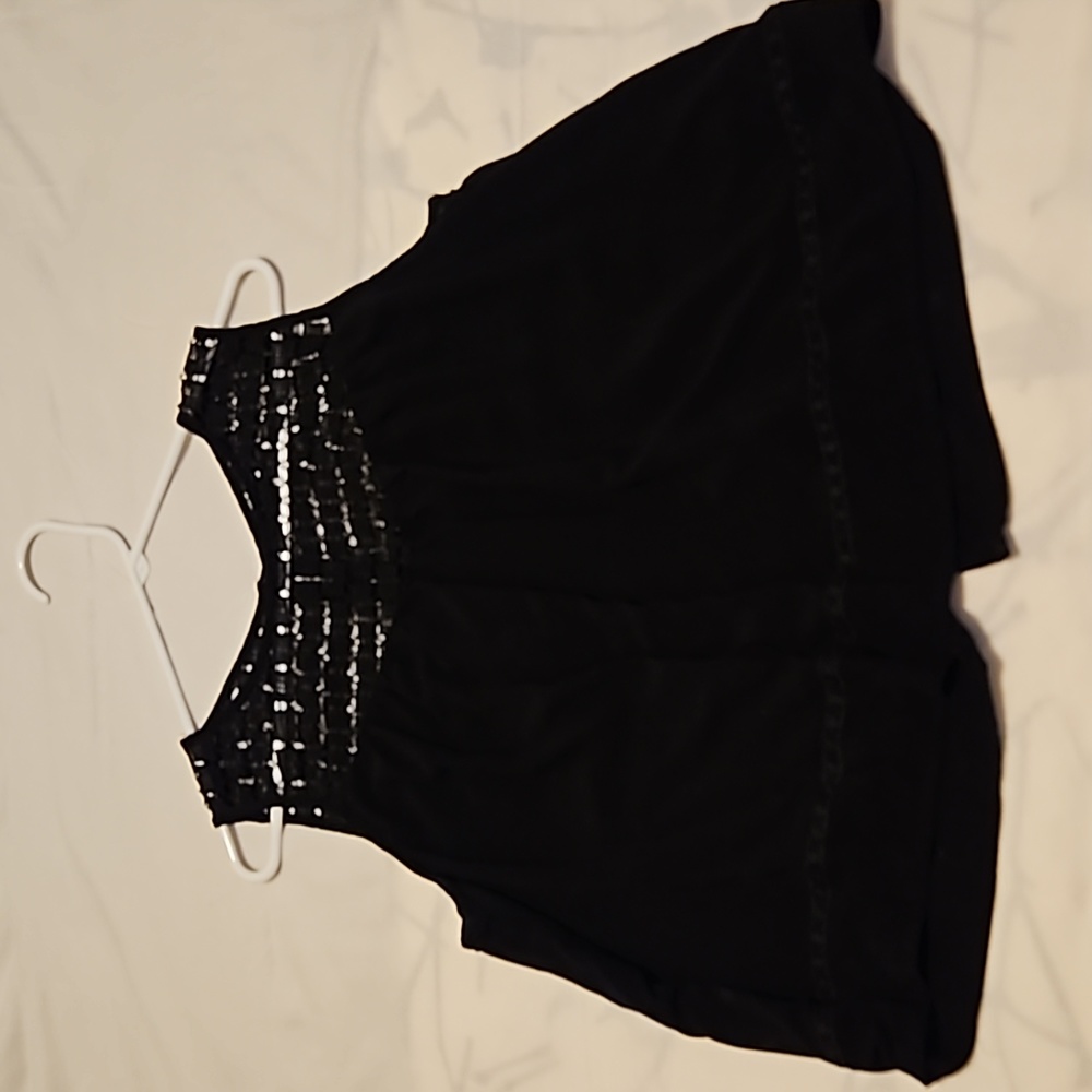 Lace trimmed sleeveless blouse